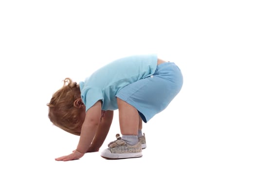 A little boy on all fours isolated on the white