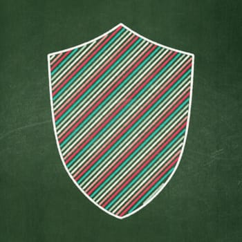 Privacy concept: Shield icon on Green chalkboard background, 3d render