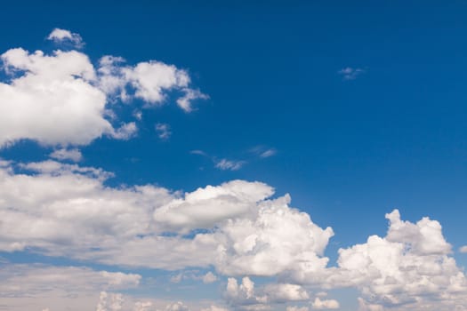 Blue summer sky with white clouds