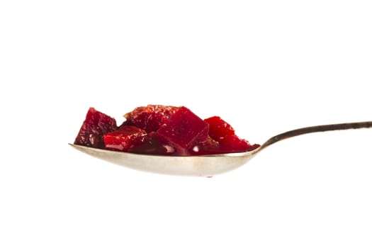 Isolated spoonful of borscht soup.