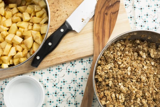 Ingredients and cooking utensils used for making apple crumble