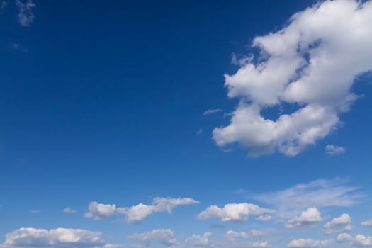 Blue summer sky with white clouds