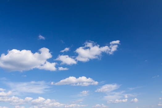 Blue summer sky with white clouds