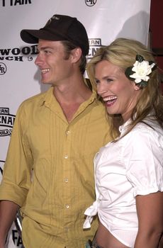 Natasha Henstridge and Liam Waite at the launch party for Eastwood Ranch's new lifestyle brand with "Denim Tapas and Tequila" held at Chadwick, Beverly Hills, CA 07-16-02