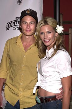 Natasha Henstridge and Liam Waite at the launch party for Eastwood Ranch's new lifestyle brand with "Denim Tapas and Tequila" held at Chadwick, Beverly Hills, CA 07-16-02