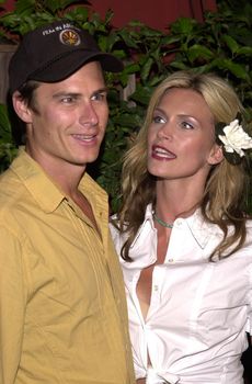 Natasha Henstridge and Liam Waite at the launch party for Eastwood Ranch's new lifestyle brand with "Denim Tapas and Tequila" held at Chadwick, Beverly Hills, CA 07-16-02