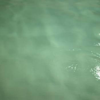 Small waves on the water of a pool