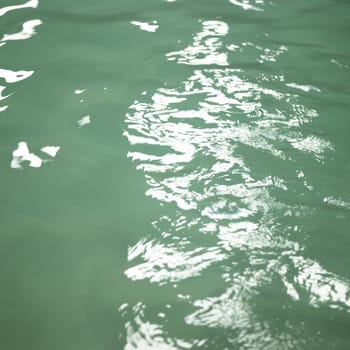 Small waves on the water of a pool