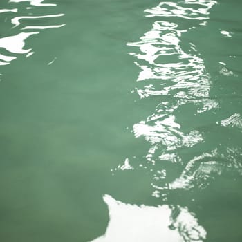 Small waves on the water of a pool