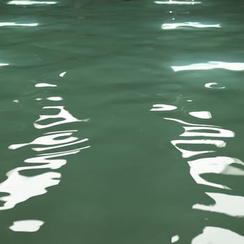 Small waves on the water of a pool