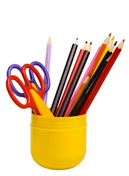 Some scissors and color pencils in a cup isolated on the white