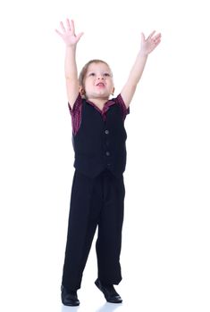 Little boy move hands up at white background