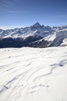 Winter mountainscape and superb frontal view on the majestic M. Viso (3841 m), Po Valley, Piedmont