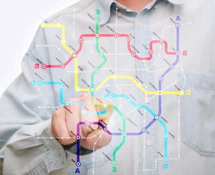 Man's Hand Pushing City Transport Map on Touch Screen