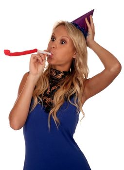 Lovely blonde party girl with hat and toy whistle