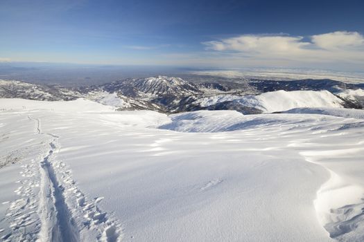 Ski touring (back country skiing) in majestic high mountain scenery, italian Alps