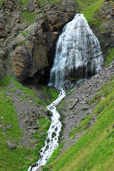 Waterfall Girlish Braids between the mountains of Northern Caucas