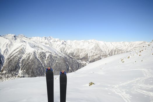 Back country ski in scenic alpine backgrounds