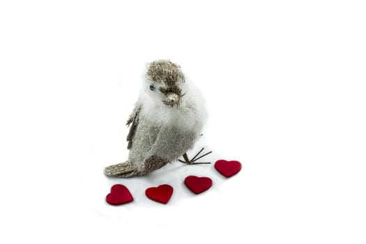 Small bird and hearts on white background for Valentines Day