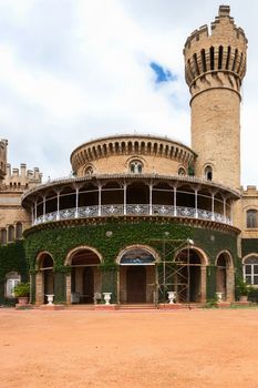 Detail of the majestic Bangalore Palace showing rotunda and watchtower in Bengaluru, India.