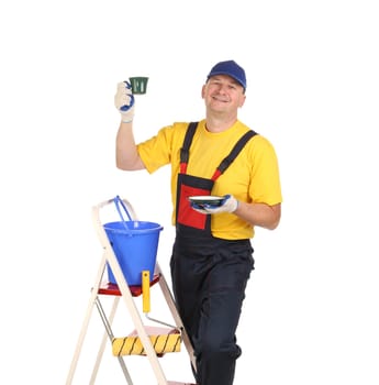 Worker on ladder with cup of tea. Isolated on a white background.