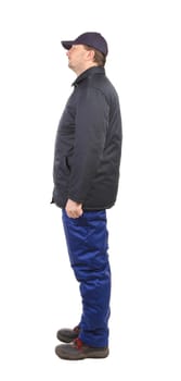 Worker in winter workwear. Side view. Isolated on a white background.