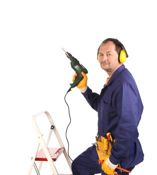 Worker in ear muffs and glasses with drill. Isolated on a white background.