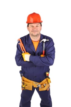 Worker in hard hat holding hammer and pliers. Isolated on a white background.
