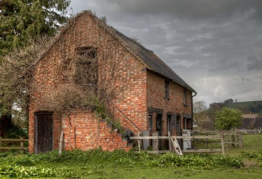 Ruined brick stable, Mickleton, Gloucestershire, England.