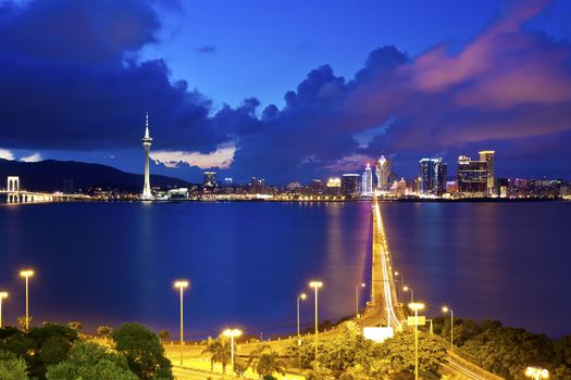 Macau cityscape along the coast at night