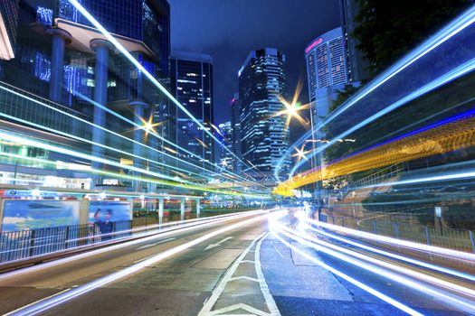 Traffic in between the city at night