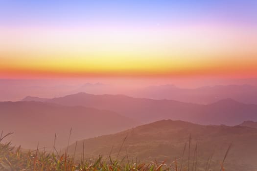 Sunrise over a mountain valley