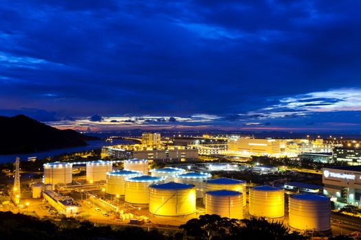 Oil tanks plant at night