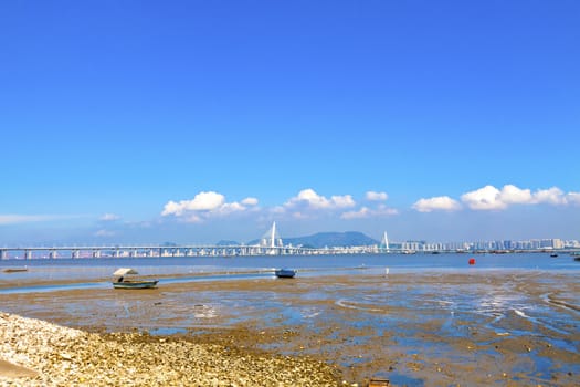 Hong Kong coast and bridge at day