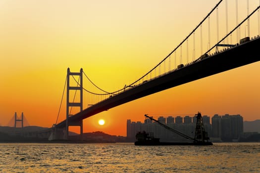 Modern bridge at sunset