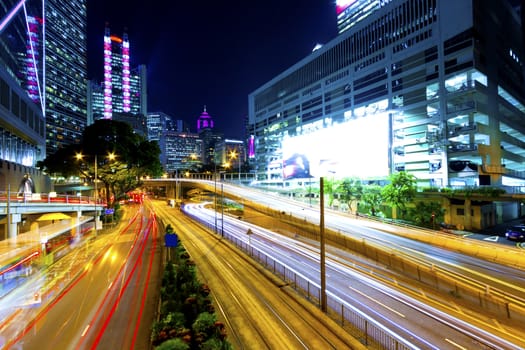 Downtown traffic at night in modern city