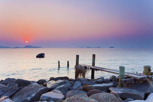 Sunset at rocky shore