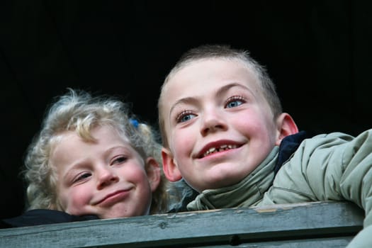 family: brother and sister: close  together