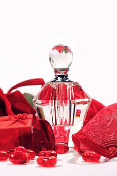 Perfume bottle, rose and red brassiere for Valentine's day