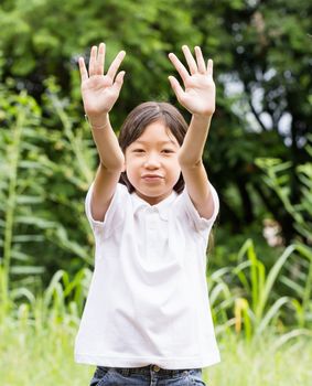 Outdoors portrait of beautiful Asian young girl