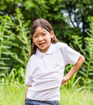 Outdoors portrait of beautiful Asian young girl