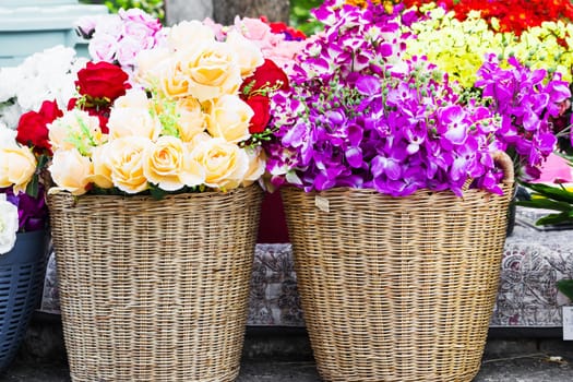 Flower fabric roses,Fake textile flower close-up  in basket