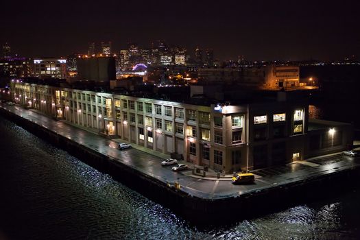 Night view of the Boston Massachusetts port and skyline.