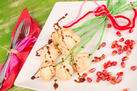 Puff pastry snack arranged as a bunch of Valentienes day roses