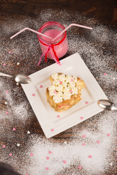 Heart shaped dessert with two spoons, Valentines day  food