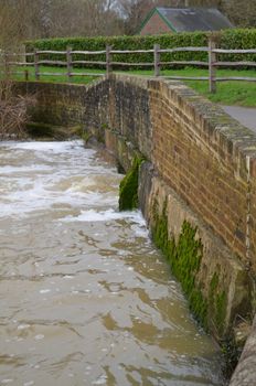 A river is near to bursting its banks along a stretch of the River Ouse in Sussex,England.