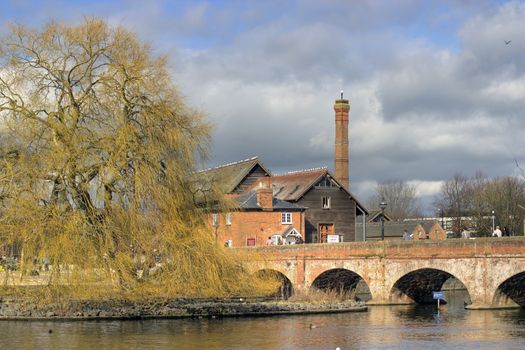 The old footbridge and mill on the River Avon, Stratford on Avon, Warwickshire, England.