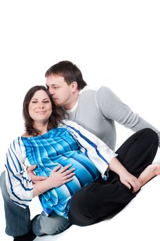 Pregnant woman with husband isolated on white