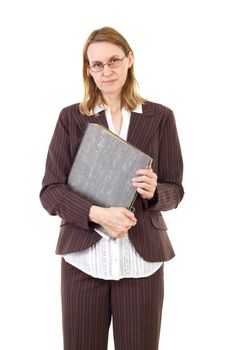 Serious businesswoman holding ring binder with old documents