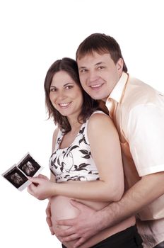 Expectant parents with baby picture isolated on white